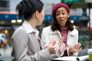 Businesswomen talking