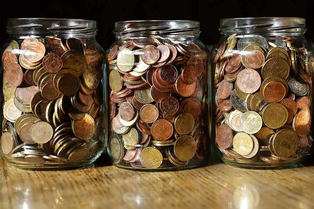 Pensions and IHT: beware April 2027 9 Three jars of coins